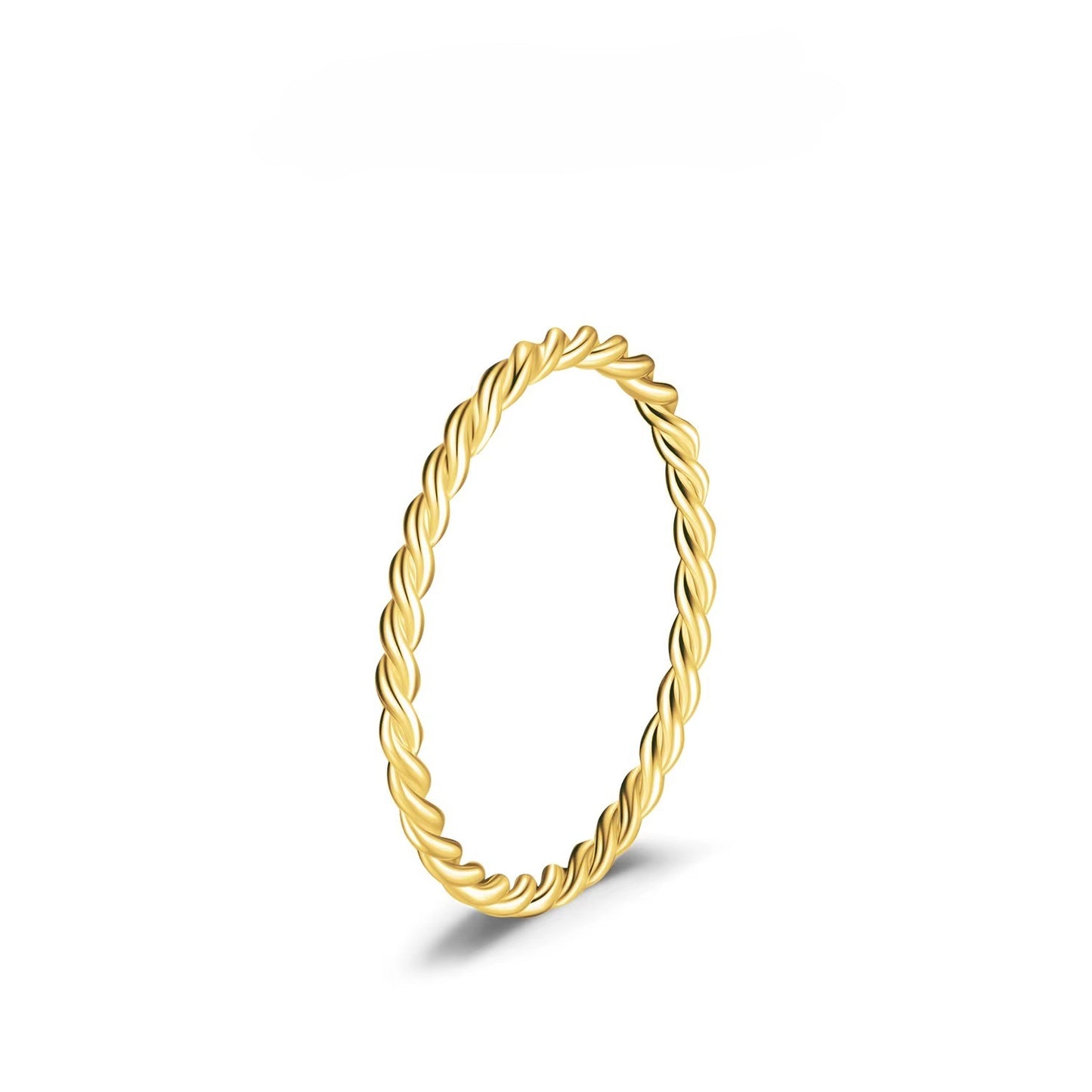 Gold ring with a twisted design on a white background