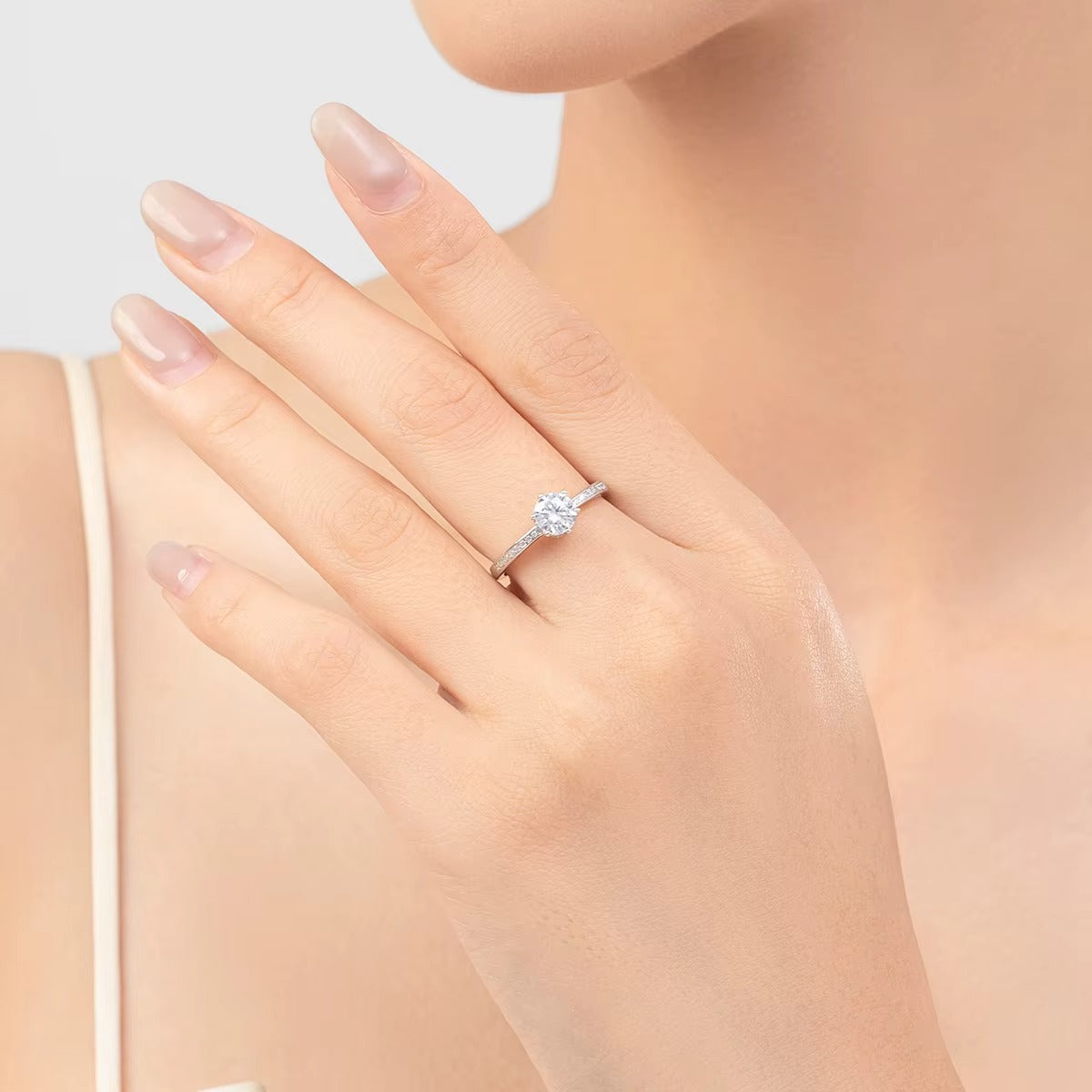 Zircon ring on a hand with a soft background