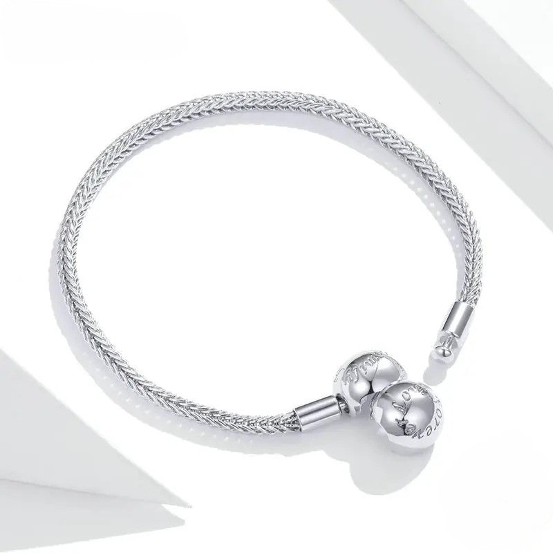 925 sterling silver snake-chain bracelet with polished sphere clasp on white background